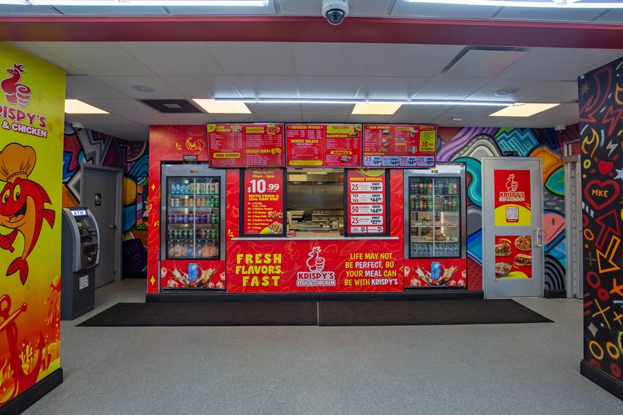 The order counter and menu boards inside Krispy's
