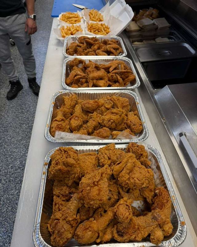 A row of chicken pans lined up on the counter